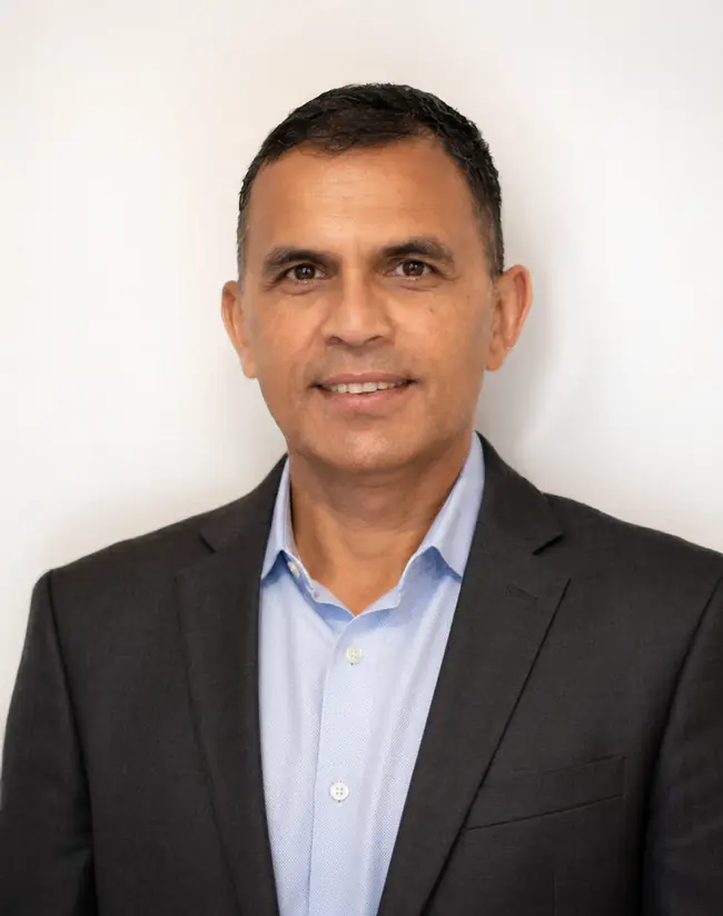 Professional headshot of Dr. Rakesh Kumar Shah, Partner, Healthcare & Operations Insight