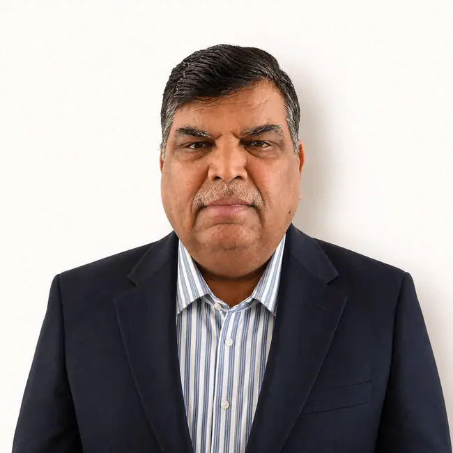 Professional headshot of Rakesh Sharma, Founder, Construction & Development Lead